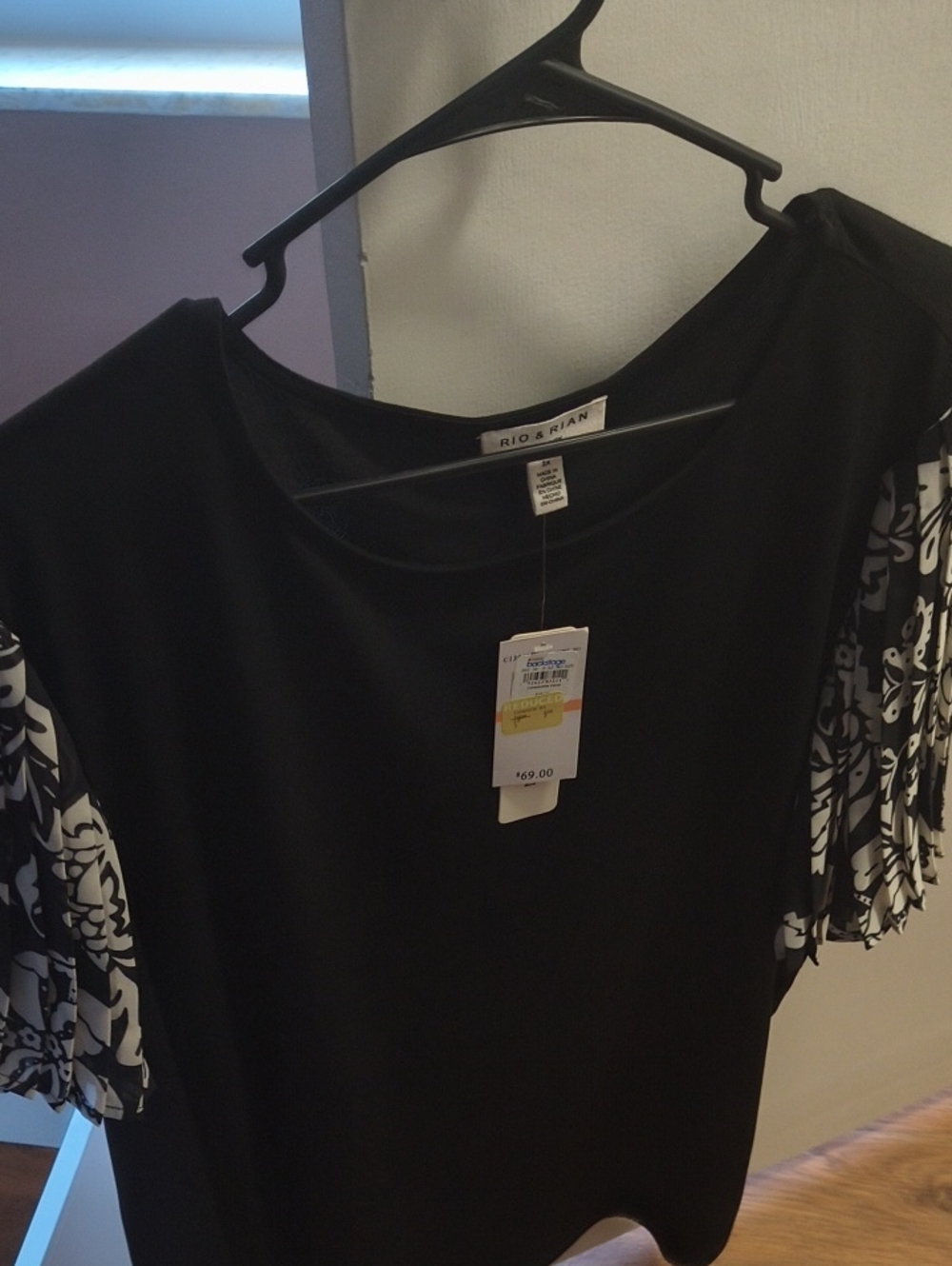 Black Top with Patterned Short Sleeves